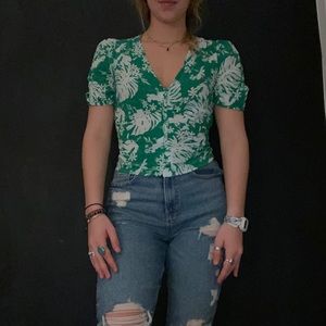 Green button up crop top with floral design